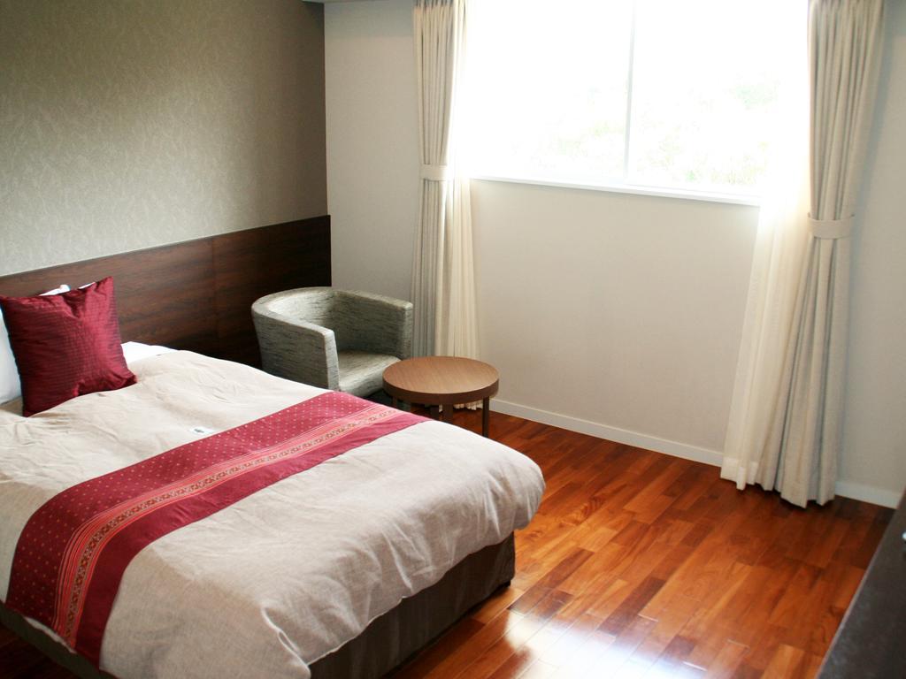 Hotel Hamahigashima Resort Uruma Exterior foto